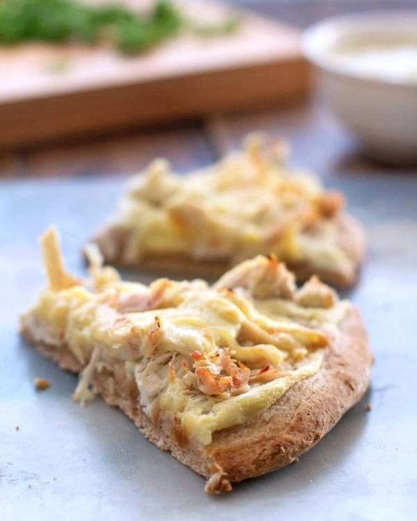 Whole wheat pizza dough cooked with toppings.