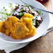 Garlic Tostones: Puerto Rican Fried Plantains perfect with rice and beans. Simple and so addicting. | pinchofyum.com