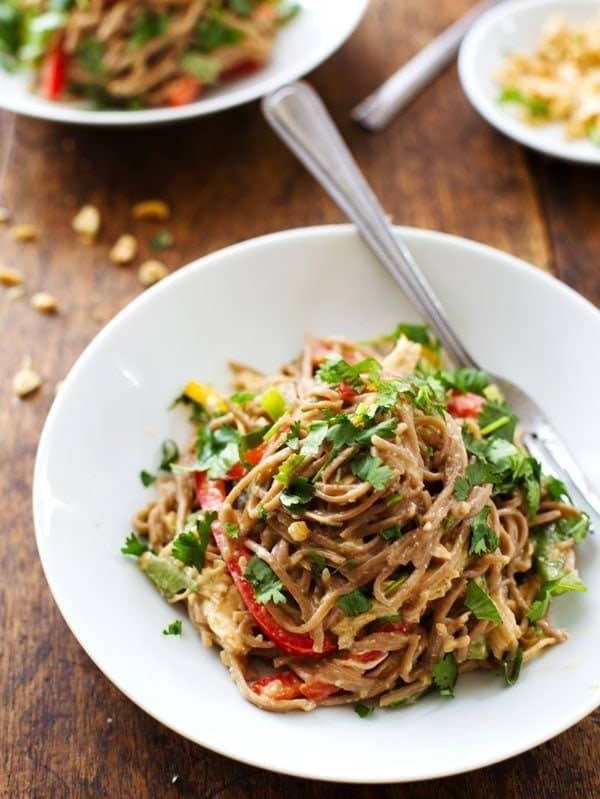 Spicy Peanut Chicken Soba Noodle Salad - colorful bell peppers with chewy soba noodles, shredded chicken, and a life changingly simple Spicy Peanut Sauce. Hot or cold, yumyumyum. 320 calories. | pinchofyum.com