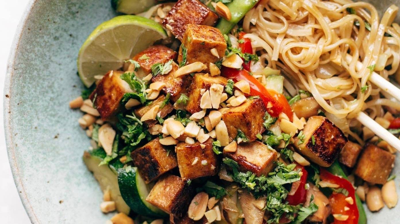Noodle Stiry Fry in bowl with chopsticks.