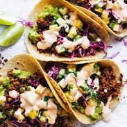 Walnut Chorizo Tacos in a row.